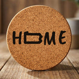 Pennsylvania round cork coaster engraved with HOME using the state outline as the letter O