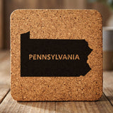 Pennsylvania square cork coaster engraved with the state shape and PENNSYLVANIA in bold lettering