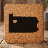 Pennsylvania square cork coaster engraved with the state shape and a heart