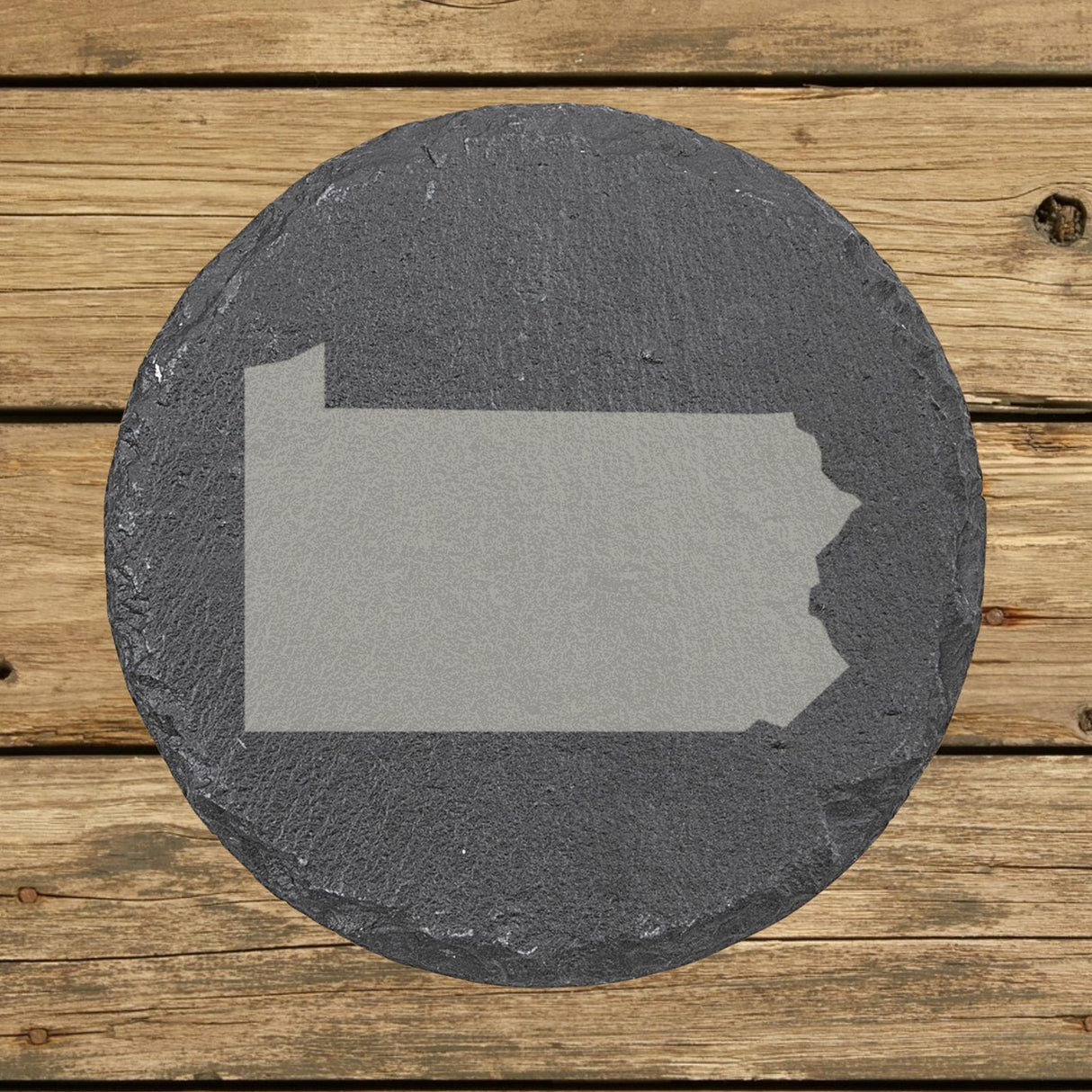 Pennsylvania round slate coaster with the full state shape engraved