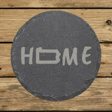 Pennsylvania round slate coaster engraved with HOME using the state outline as the letter O