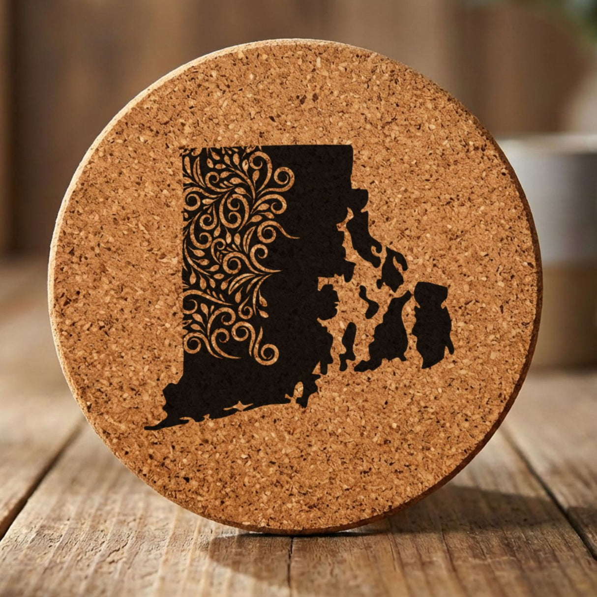 Rhode Island round cork coaster engraved with the state shape in ornate floral scrollwork