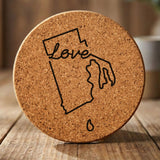 Rhode Island round cork coaster engraved with a hand-drawn state outline and love in cursive