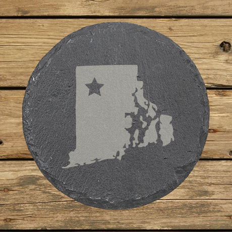 Rhode Island round slate coaster engraved with the state shape and a star