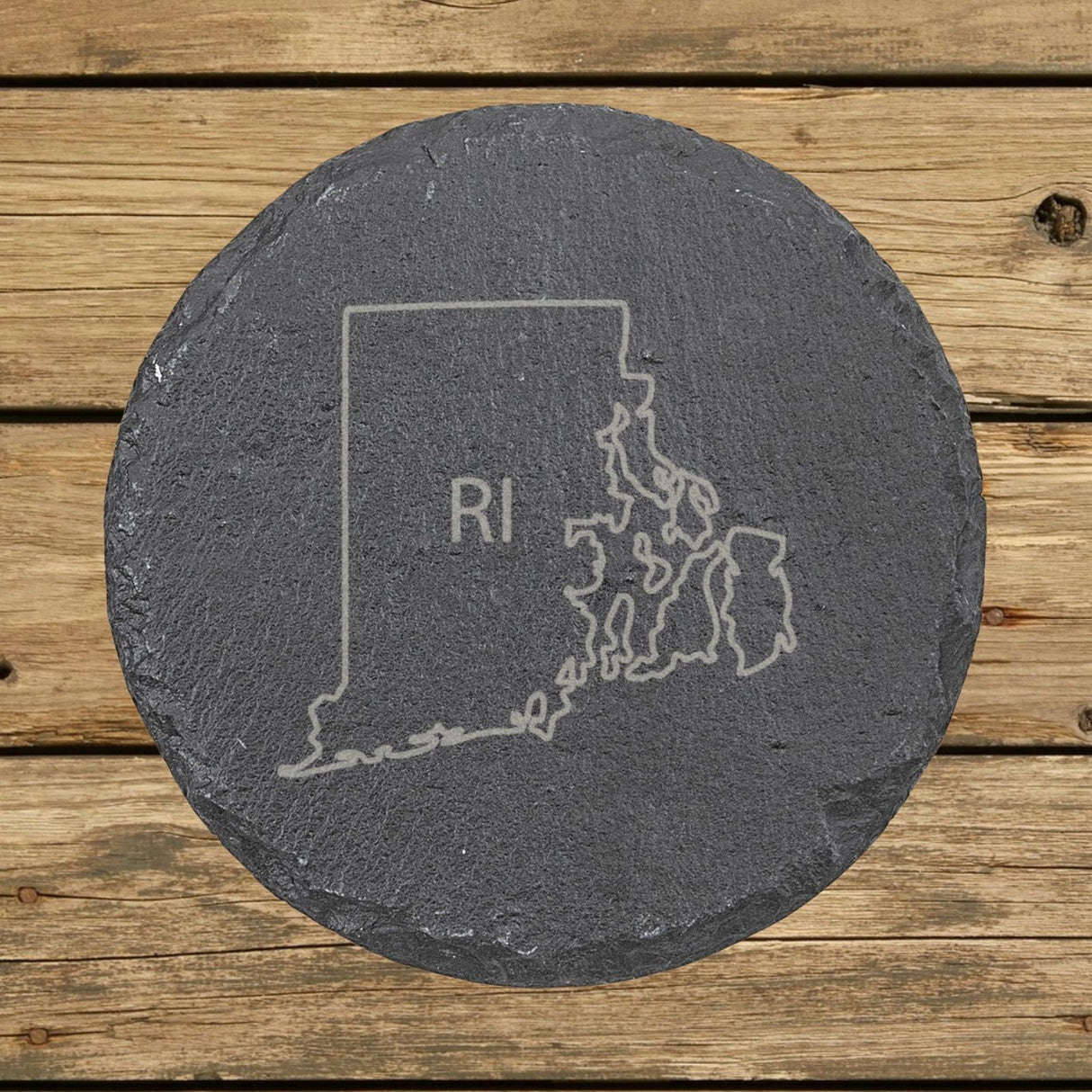 Rhode Island round slate coaster engraved with the state outline and RI initials