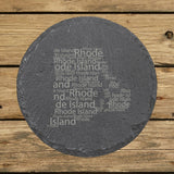 Rhode Island round slate coaster engraved with a word cloud of repeating Rhode Island text