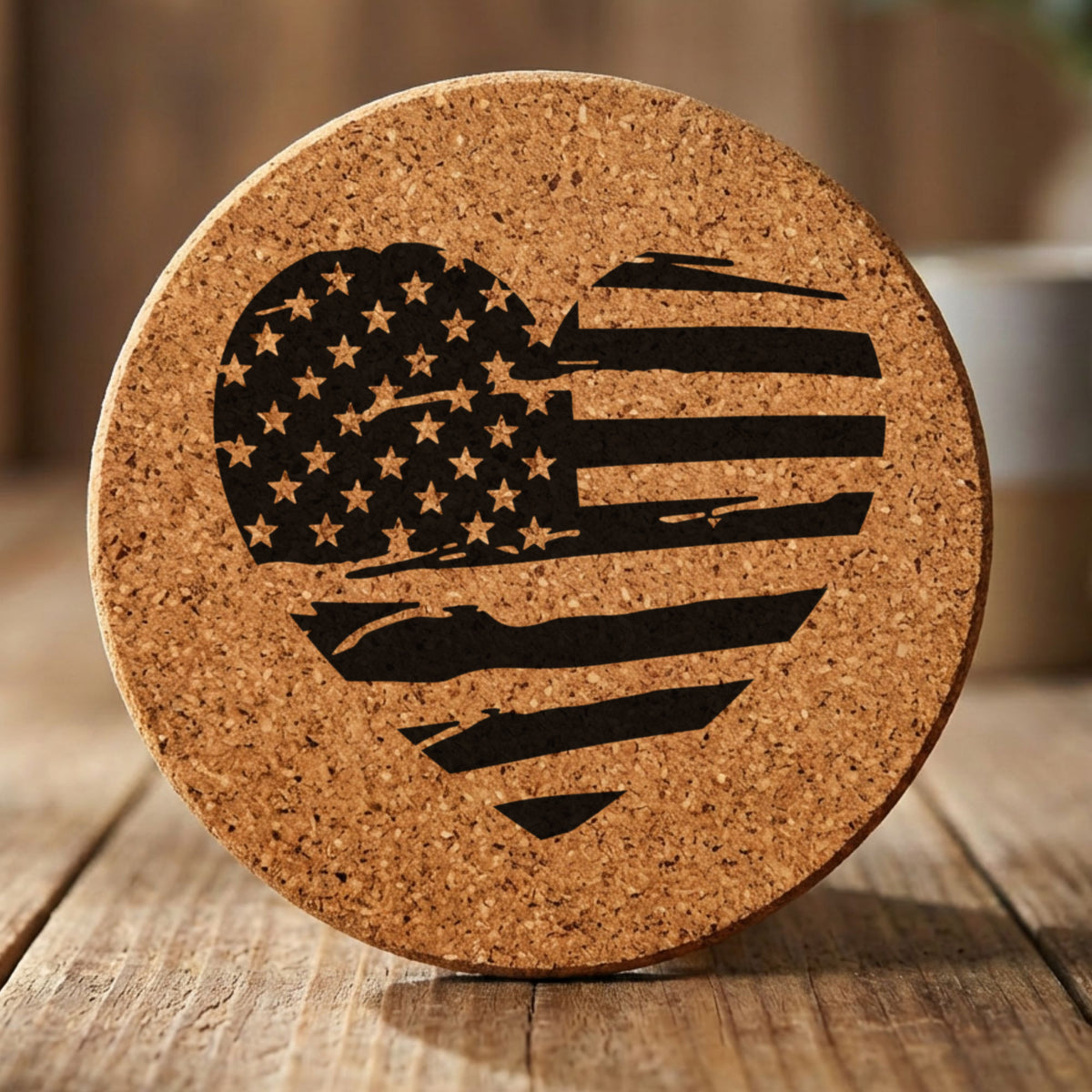 Round cork coaster laser engraved with an American flag, heart design