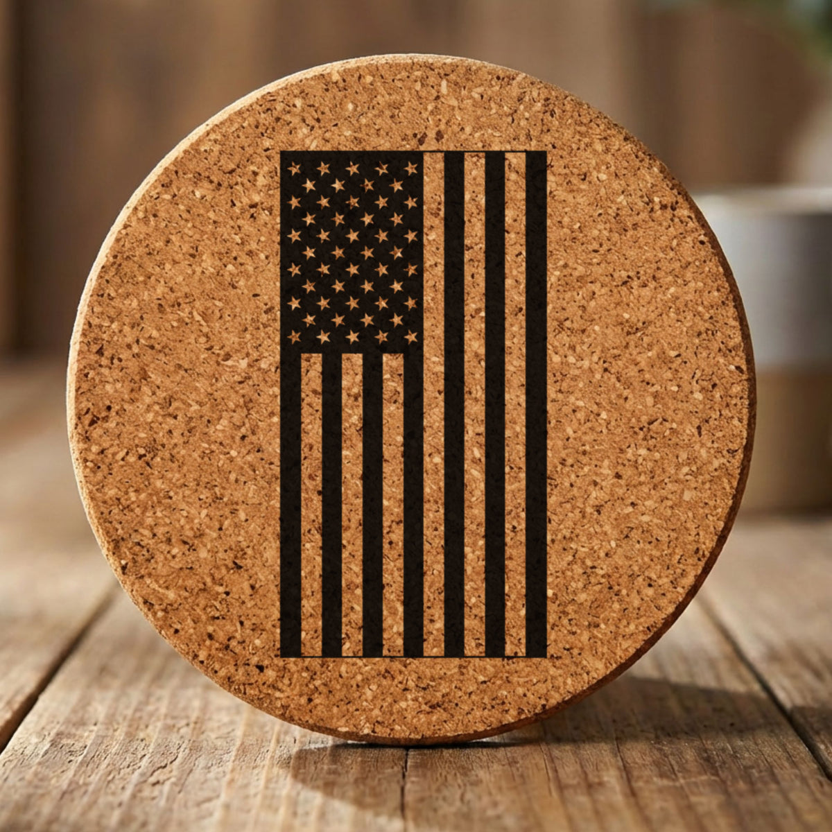 Round cork coaster laser engraved with an American flag, vertical design