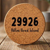 Round cork coaster laser engraved with a custom zip code design