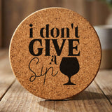 Round cork coaster laser engraved with "I Don't Give a Sip"