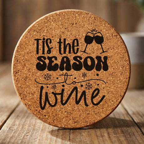 Round cork coaster laser engraved with "'Tis the Season to Wine"
