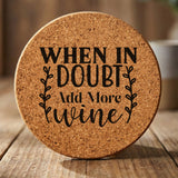 Round cork coaster laser engraved with "When in Doubt, Add More Wine", wreath design