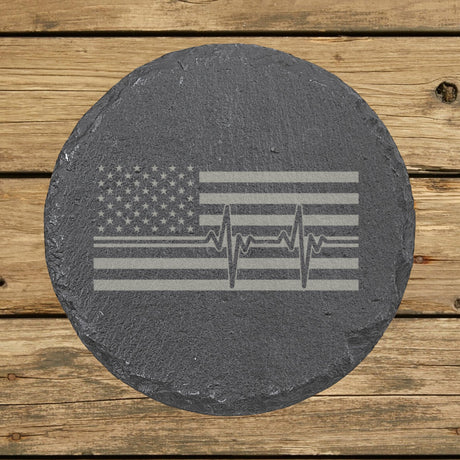 Round slate coaster laser engraved with an American flag, heartbeat design