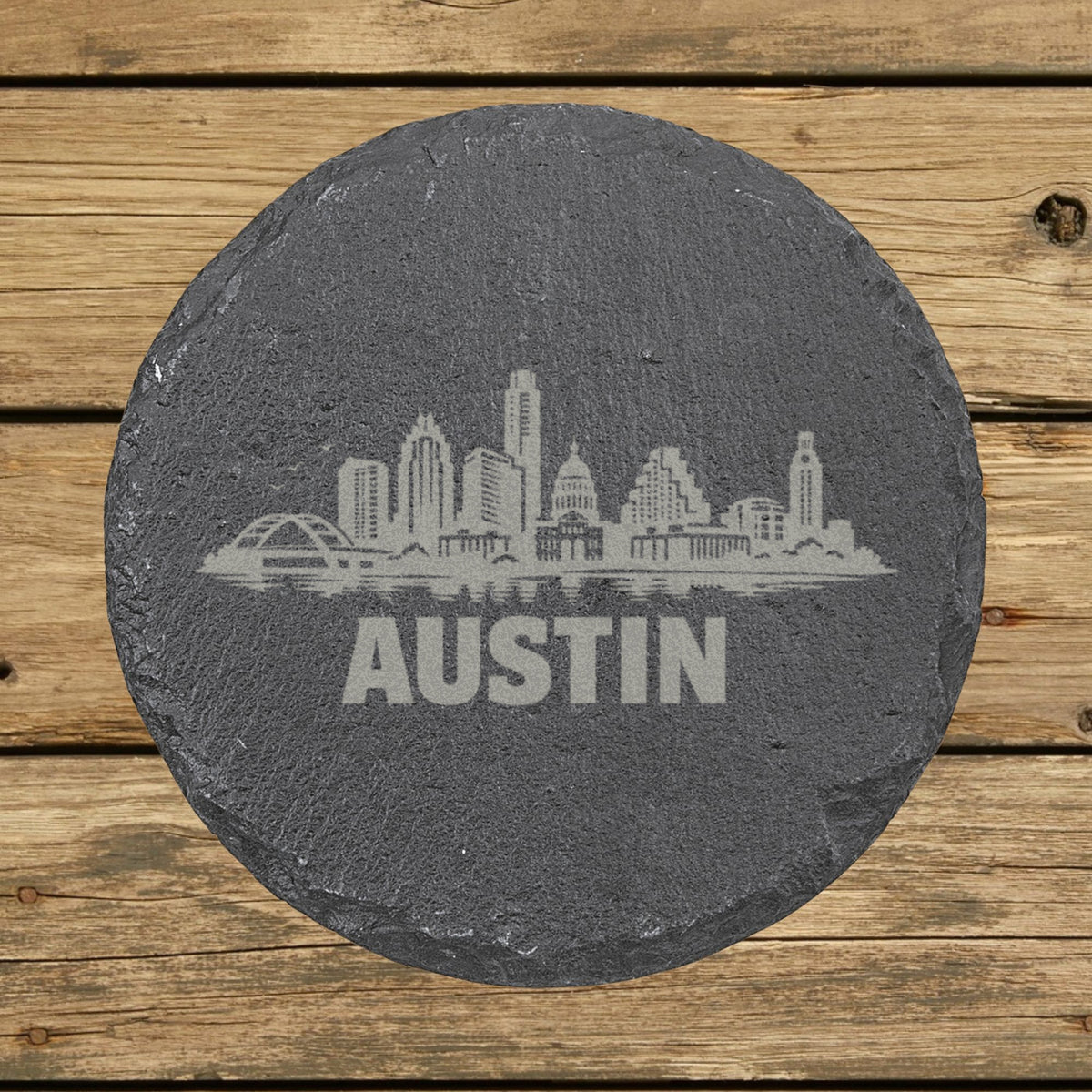 Round slate coaster laser engraved with the Austin, Texas skyline