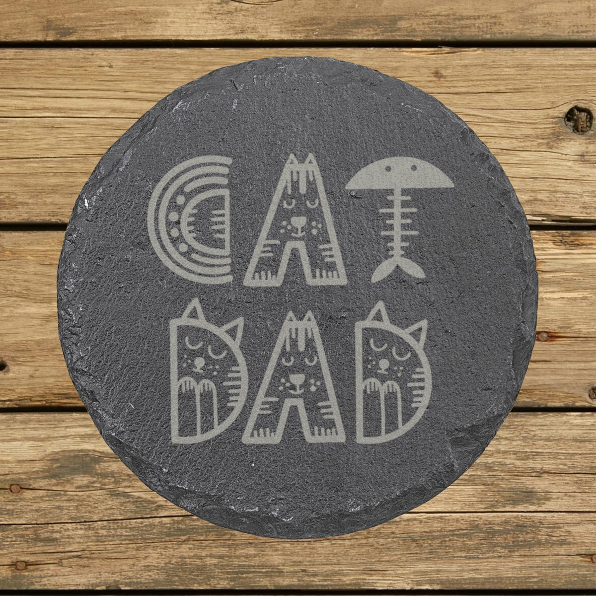 Round slate coaster laser engraved with "Cat Dad", illustrated design