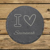 Round slate coaster laser engraved with a custom zip code design