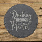 Round slate coaster laser engraved with "Dashing Through the Merlot"