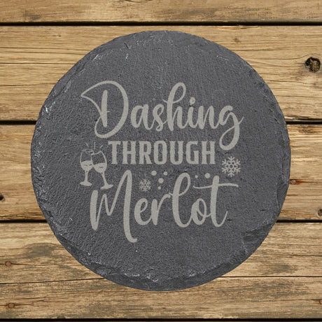 Round slate coaster laser engraved with "Dashing Through the Merlot"