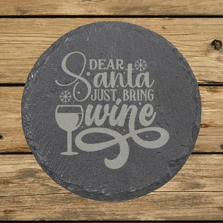 Round slate coaster laser engraved with "Dear Santa, Just Bring Wine", wine glass design