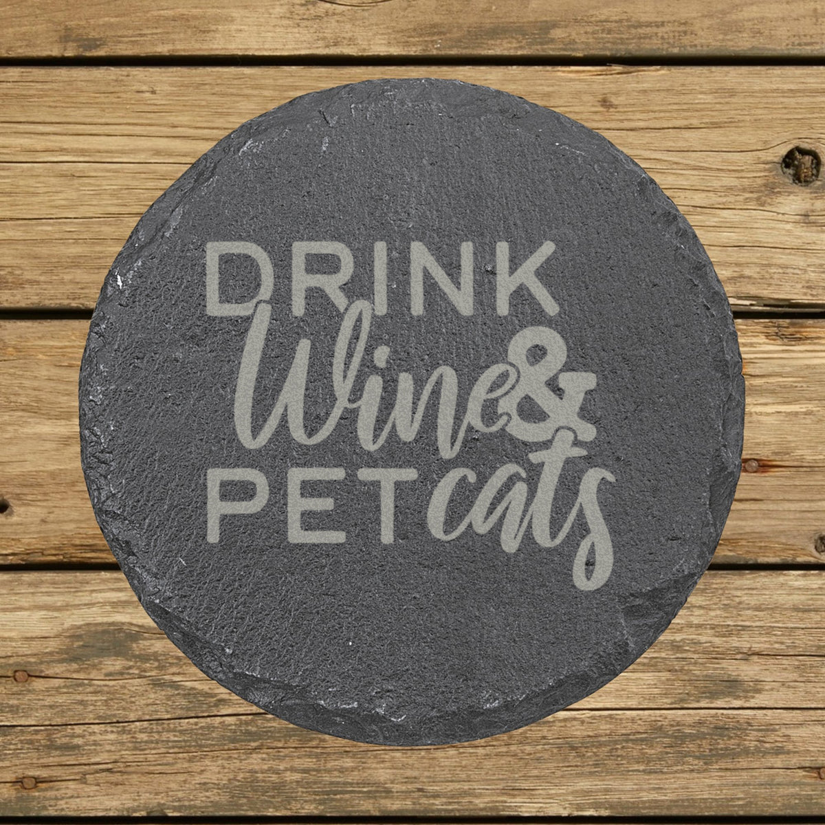Round slate coaster laser engraved with "Drink Wine and Pet Cats"