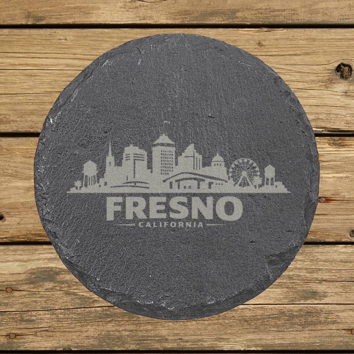 Round slate coaster laser engraved with the Fresno, California skyline