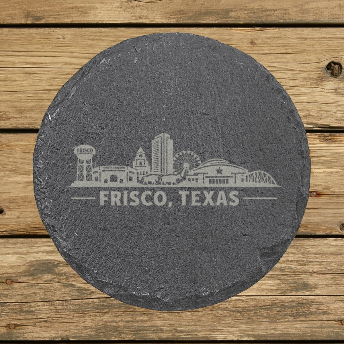 Round slate coaster laser engraved with the Frisco, Texas skyline