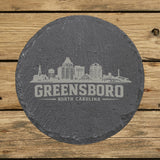 Round slate coaster laser engraved with the Greensboro, North Carolina skyline