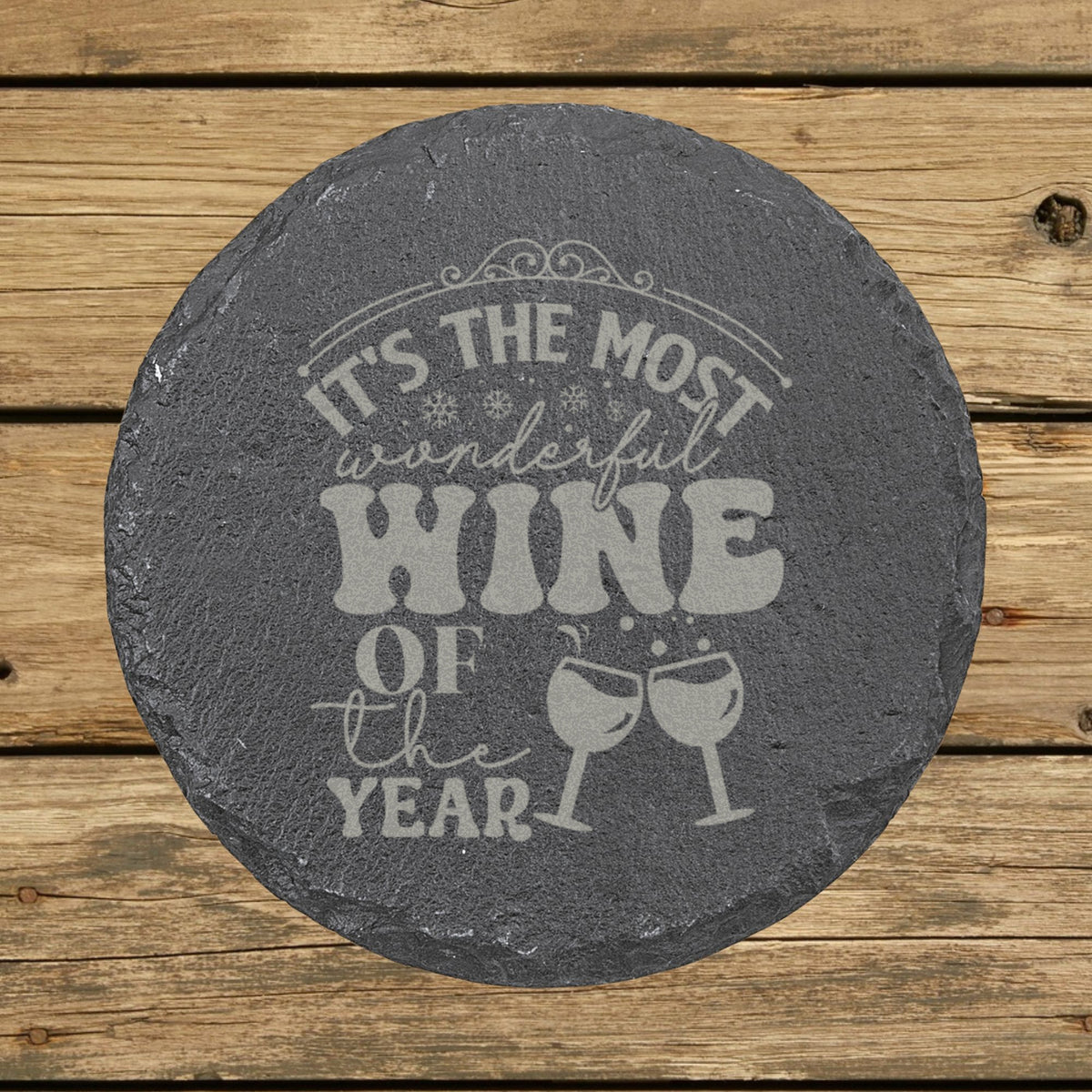 Round slate coaster laser engraved with "It's the Most Wonderful Wine of the Year"