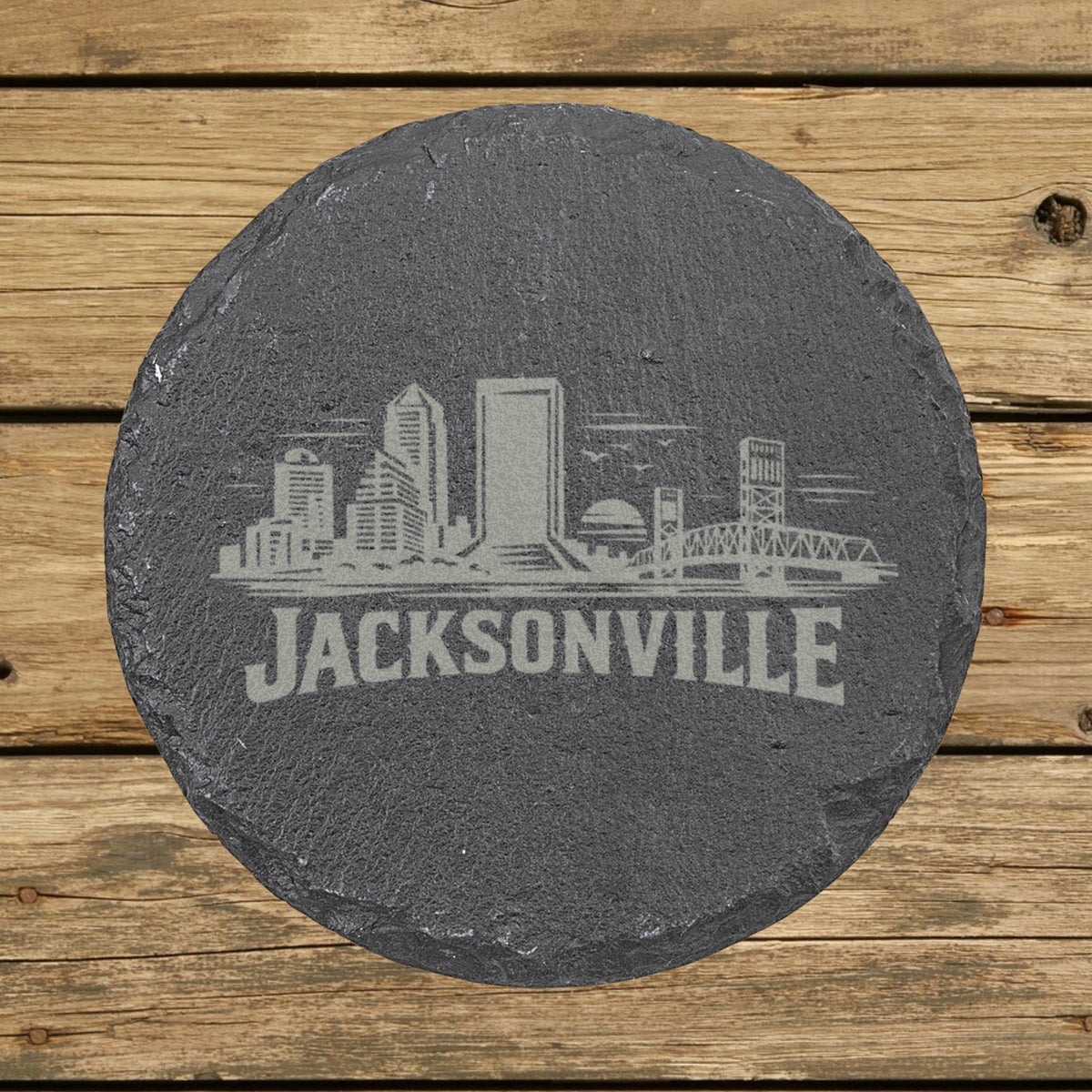 Round slate coaster laser engraved with the Jacksonville, Florida skyline