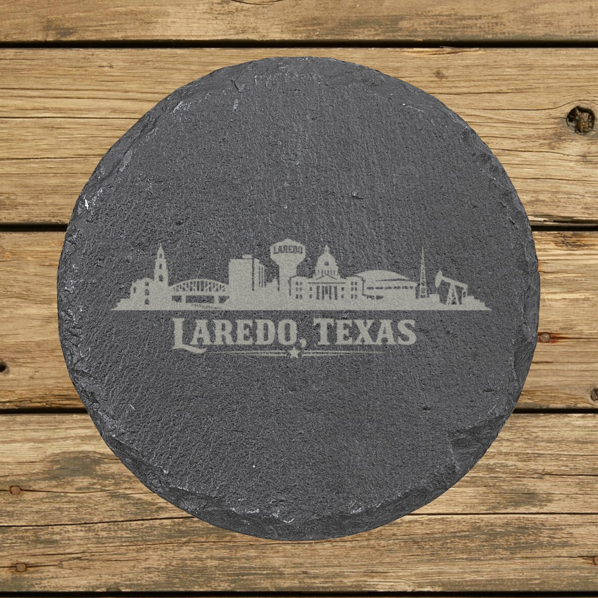 Round slate coaster laser engraved with the Laredo, Texas skyline