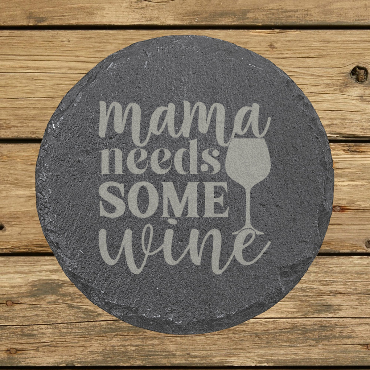 Round slate coaster laser engraved with "Mama Needs Some Wine"