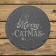 Round slate coaster laser engraved with "Merry Catmas"