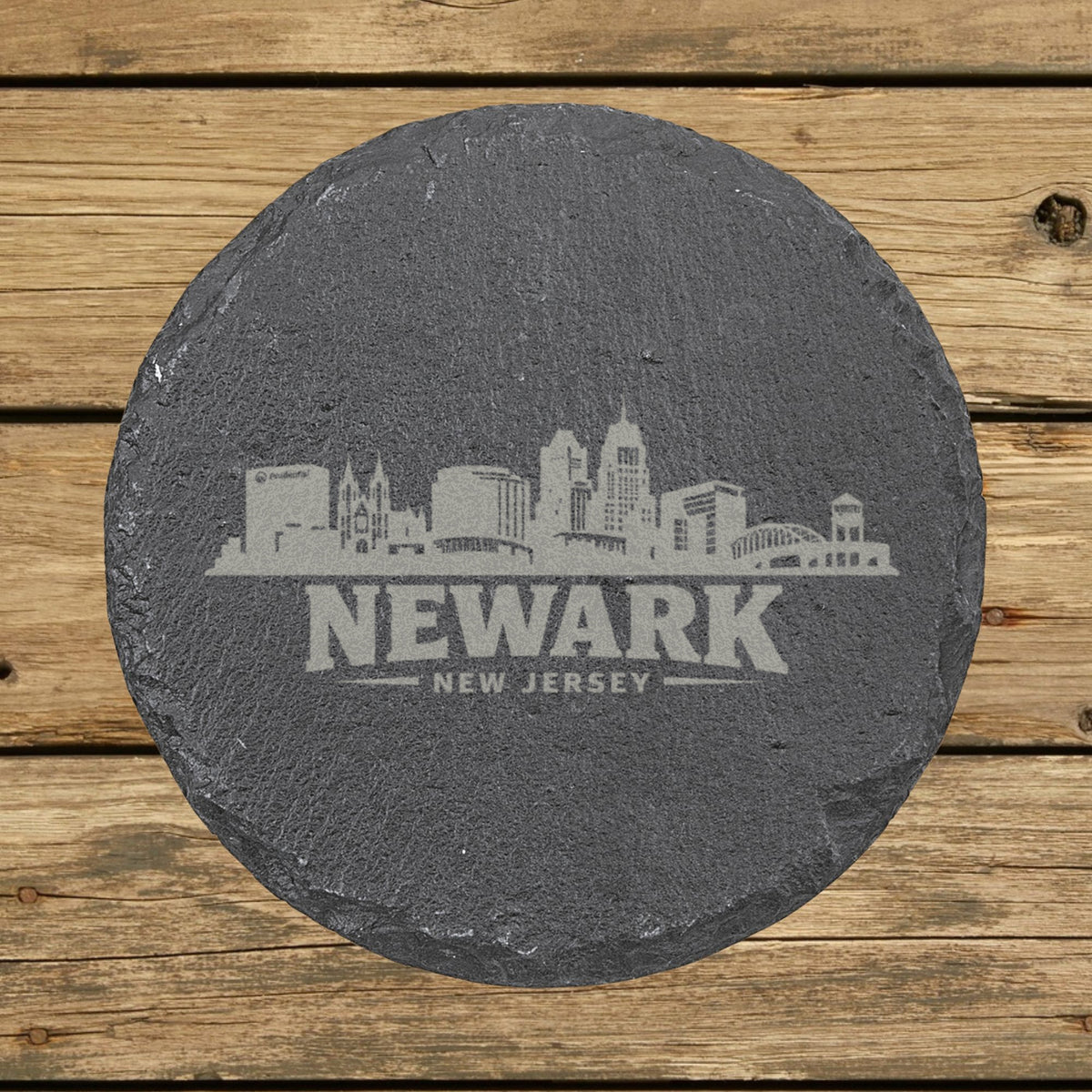 Round slate coaster laser engraved with the Newark, New Jersey skyline