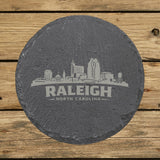 Round slate coaster laser engraved with the Raleigh, North Carolina skyline