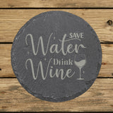Round slate coaster laser engraved with "Save Water, Drink Wine", script design