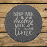 Round slate coaster laser engraved with "Sip Me Baby One More Time"