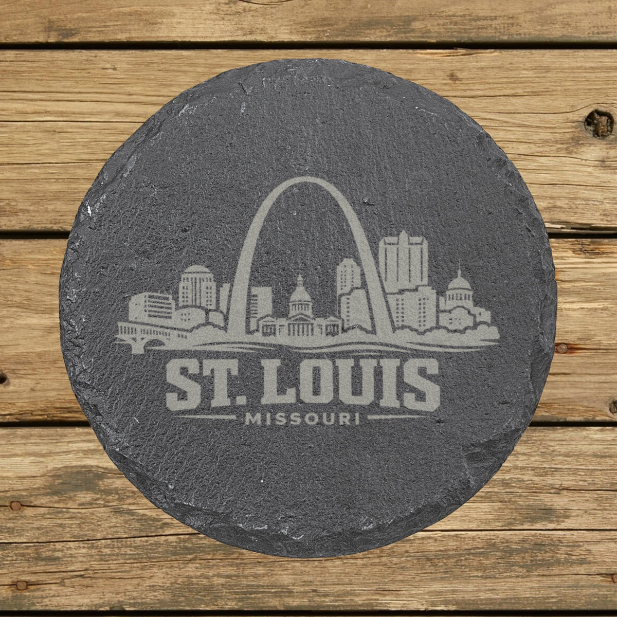 Round slate coaster laser engraved with the St. Louis, Missouri skyline