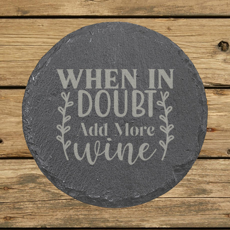 Round slate coaster laser engraved with "When in Doubt, Add More Wine", wreath design