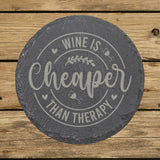 Round slate coaster laser engraved with "Wine Is Cheaper Than Therapy"