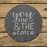 Round slate coaster laser engraved with "You, Me and the Cats"