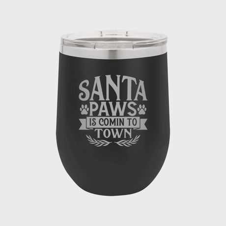 Black 12 oz stemless wine tumbler laser engraved with "Santa Paws Is Comin' to Town"