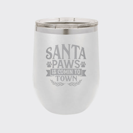 White 12 oz stemless wine tumbler laser engraved with "Santa Paws Is Comin' to Town"