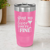 Pink 20 oz tumbler laser engraved with "Shut Up Liver, You're Fine", on a kitchen counter