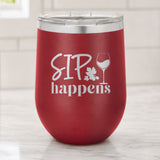 Maroon 12 oz stemless wine tumbler laser engraved with "Sip Happens", on a kitchen counter