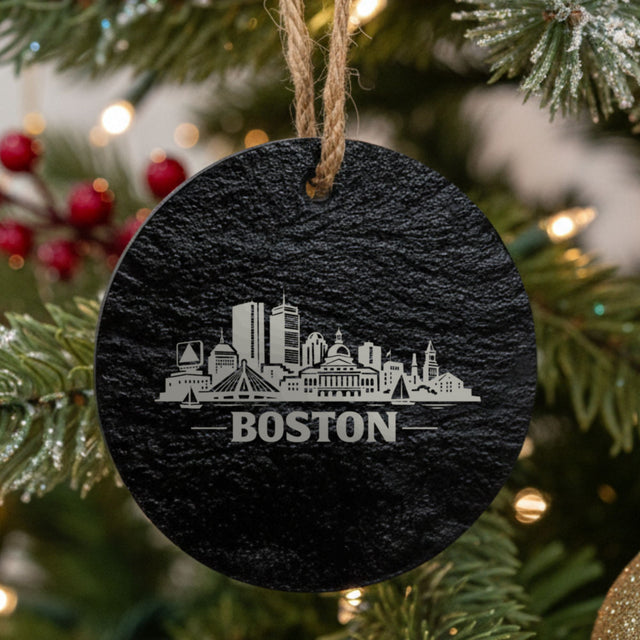 Boston, Massachusetts skyline engraved on a round slate Christmas ornament