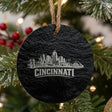 Cincinnati, Ohio skyline engraved on a round slate Christmas ornament