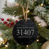 Round slate Christmas ornament laser engraved with a custom zip code design