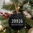 Round slate Christmas ornament laser engraved with a custom zip code design