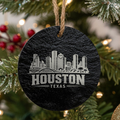 Houston, Texas skyline engraved on a round slate Christmas ornament