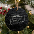 Round slate Christmas ornament laser engraved with a Connecticut design of a sperm whale